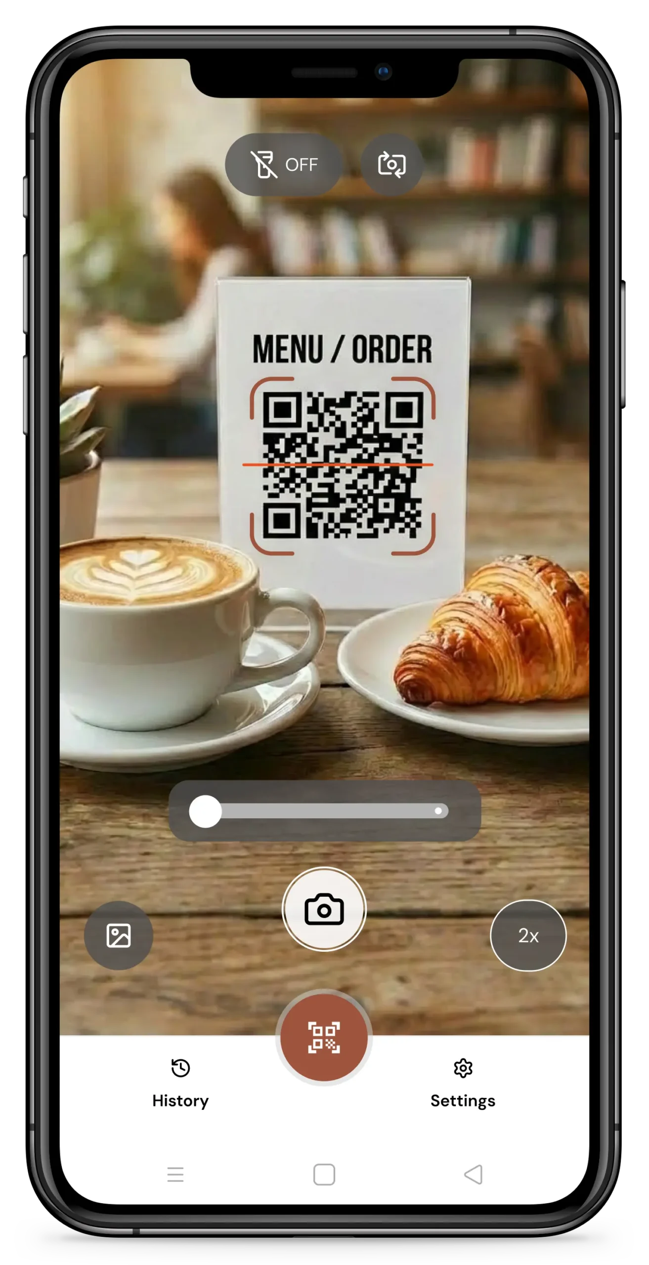 QIK QR code scanner app on Android phone scanning restaurant menu QR code with coffee and croissant - free download with offline tagging and search features